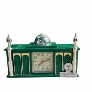 ساعة اذان اسلامية قديمة مخزنة شغالة يصل ارتفاعها 9 سم العرض 19 سم