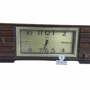 ساعة طاولة مخزنة بحالة ممتازة شغالة بالتكويك بارتفاع 14 سم والعرض 40 سم صناعة (اليابان) مع منبه وموسيقى